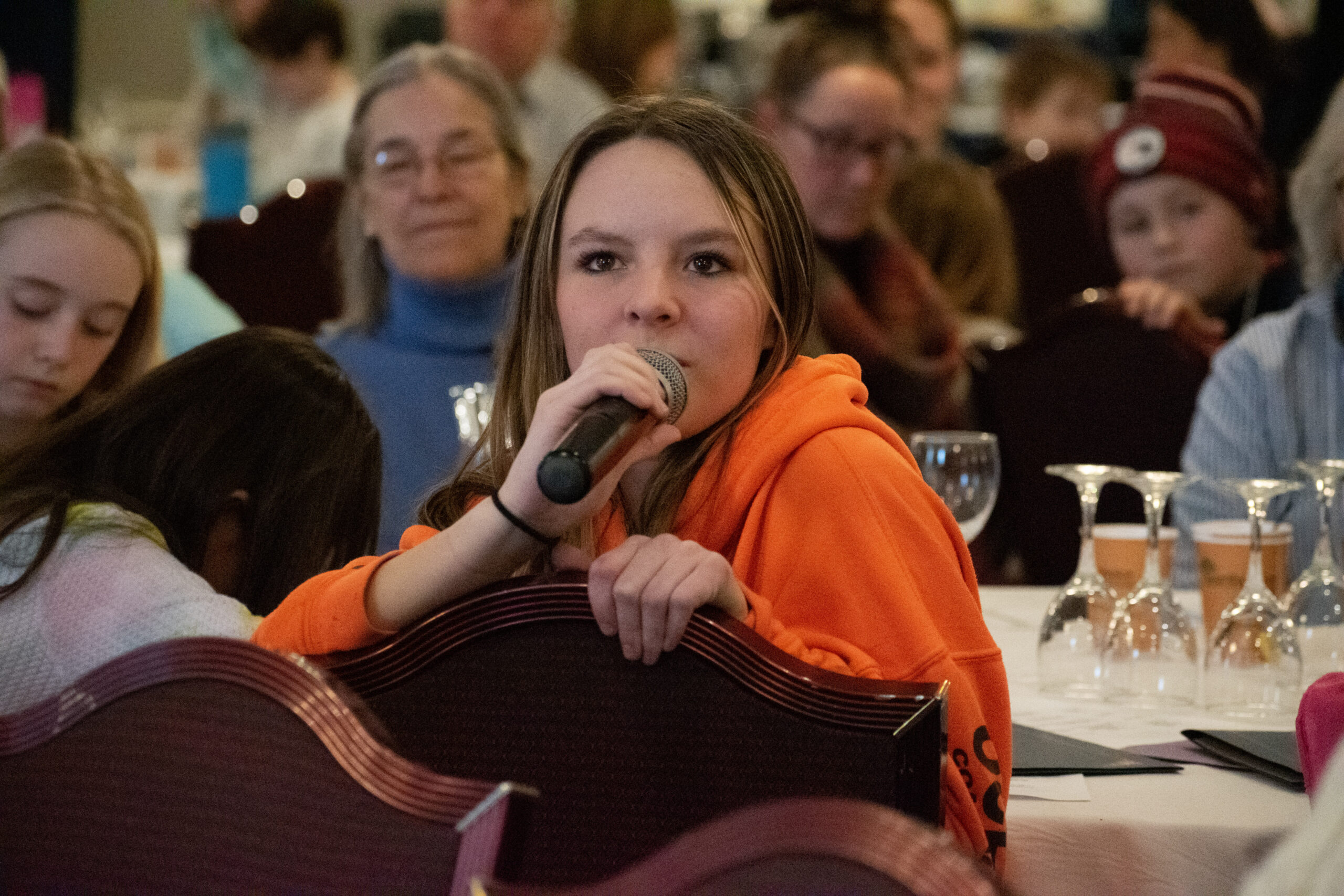 Ambassador of Mentoring, Gracie, asks a question at the Vermont Mentoring Celebration 